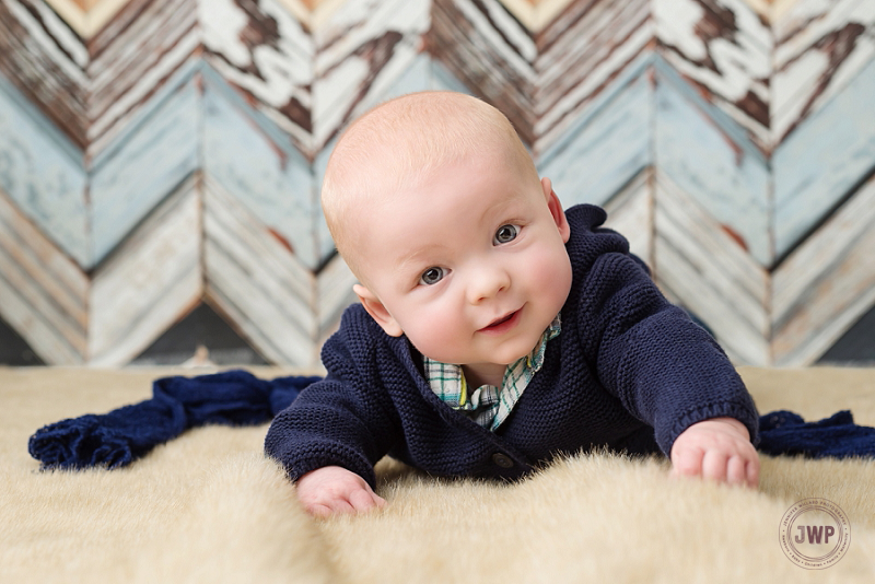 posed baby portrait 6 months old boy blue sweater Kingston Children Photographer