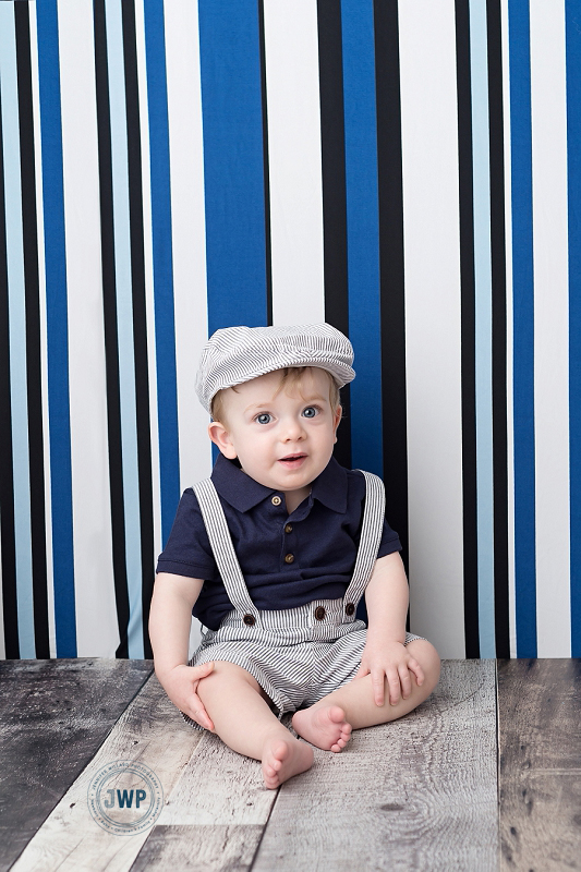 First Birthday Portraits suspenders hat striped backdrop Kingston Baby Photographer