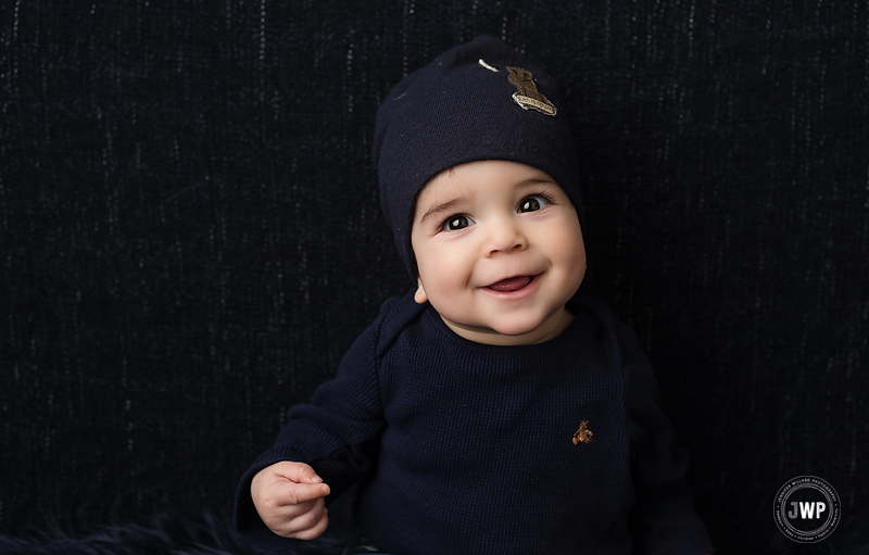 baby boy posed portrait smiling Kingston baby portrait studio