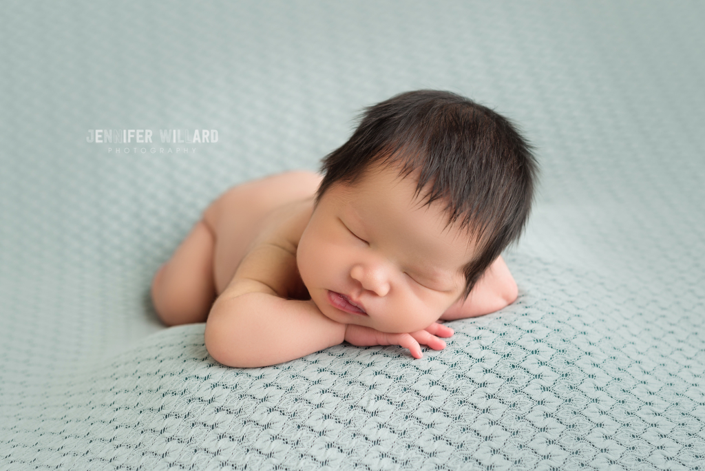 baby girl head on hands sage colour Belleville Ontario Newborn Photographer