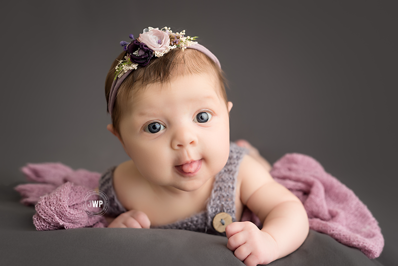 baby girl portraits grey romper grey blanket flower headband YGK Baby Photographer