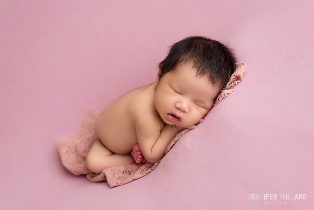 baby girl posed portrait pink fabric taco pose Brockville Newborn Photographer