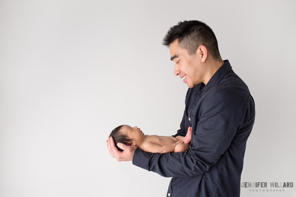 father newborn posed portrait APNPI Member Photographer