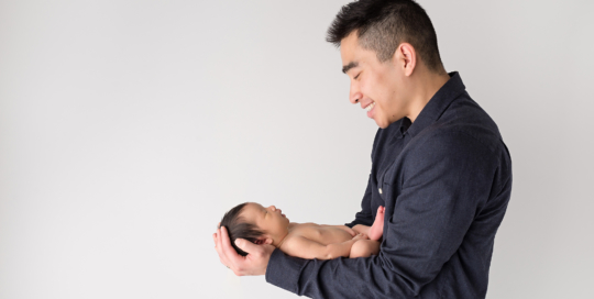 father newborn posed portrait APNPI Member Photographer