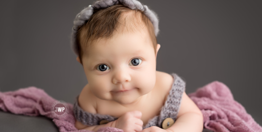 newborn baby studio portrait grey romper YGK Photographer