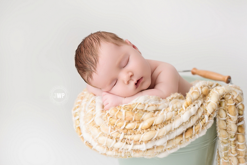 newborn posed portrait mint bucket Kingston baby Photographer