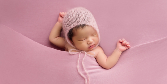 newborn posed portrait pink fabric mohair bonnet sleeping Kingston baby photographer