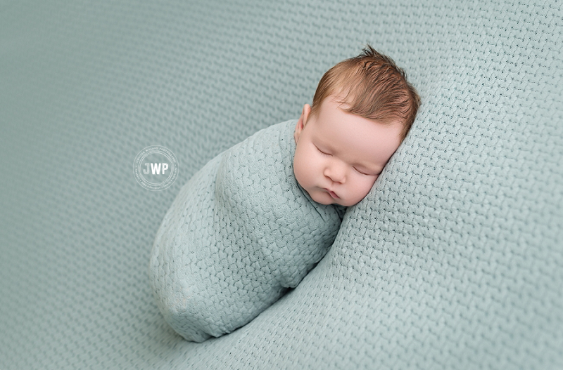 newborn posed portrait sage blanket Kingston baby Photographer