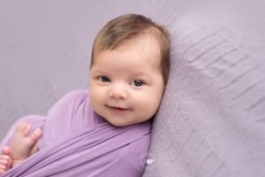 newborn posed portraits baby smiling Brockville Photographer