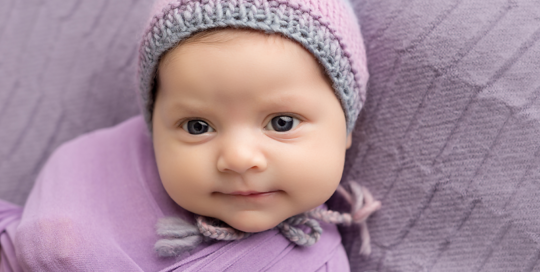 newborn posed portraits purple bonnet purple blanket purple wrap Kingston-Baby-Photographer