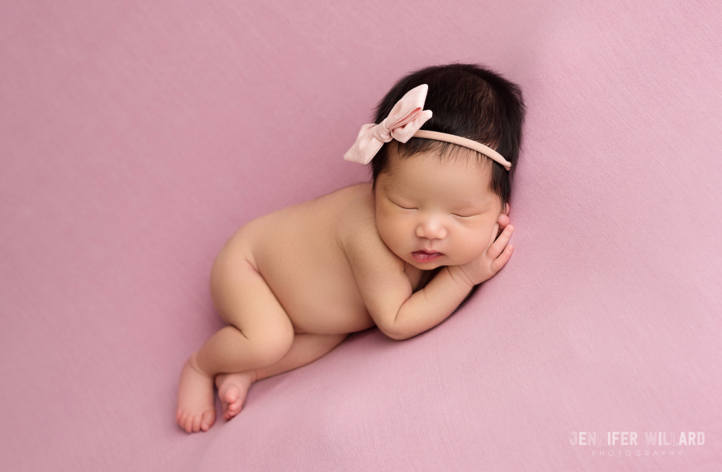 pink fabric blanket side lying pose Kingston newborn photographer