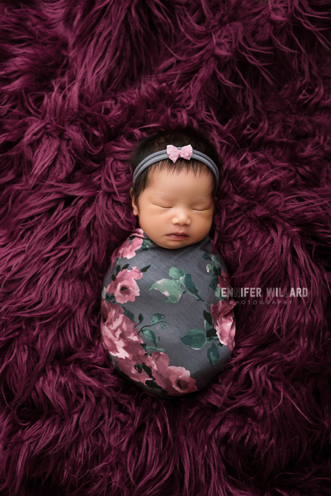 posed baby girl studio portrait purple flokati Kingston newborn photographer