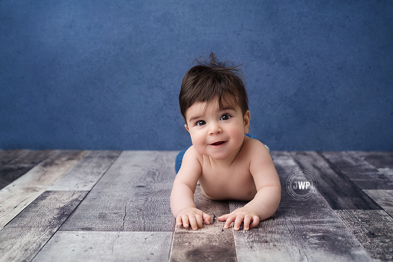 baby portrait in blue and grey backdrop