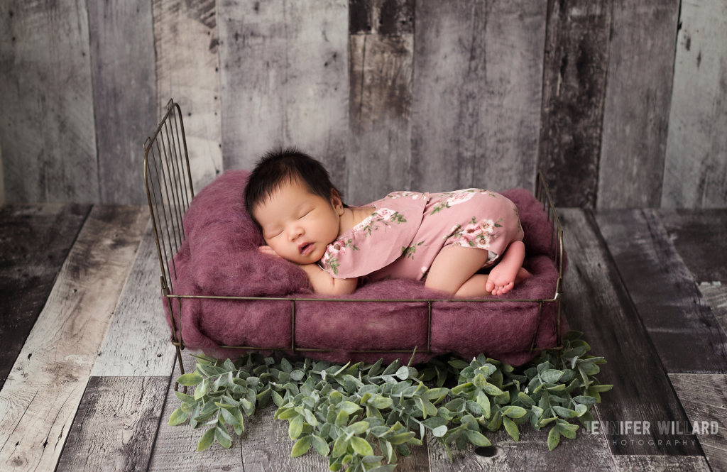 posed baby portrait on bed Kingston Newborn Photographer