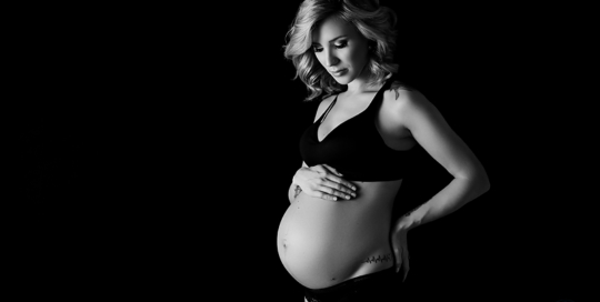 posed pregnancy portrait black and white black backdrop bra panties Kingston Maternity Photographer