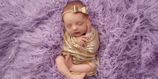 baby girl purple flokati rug gold bow wrap Kingston children studio