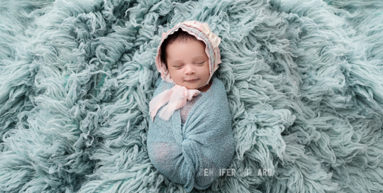 newborn baby girl posed portrait blue flokati kingston ontario photographer