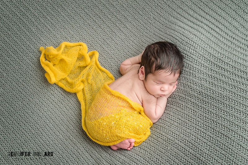 newborn posed portrait grey blanket yellow wrap Kingston infant photographer