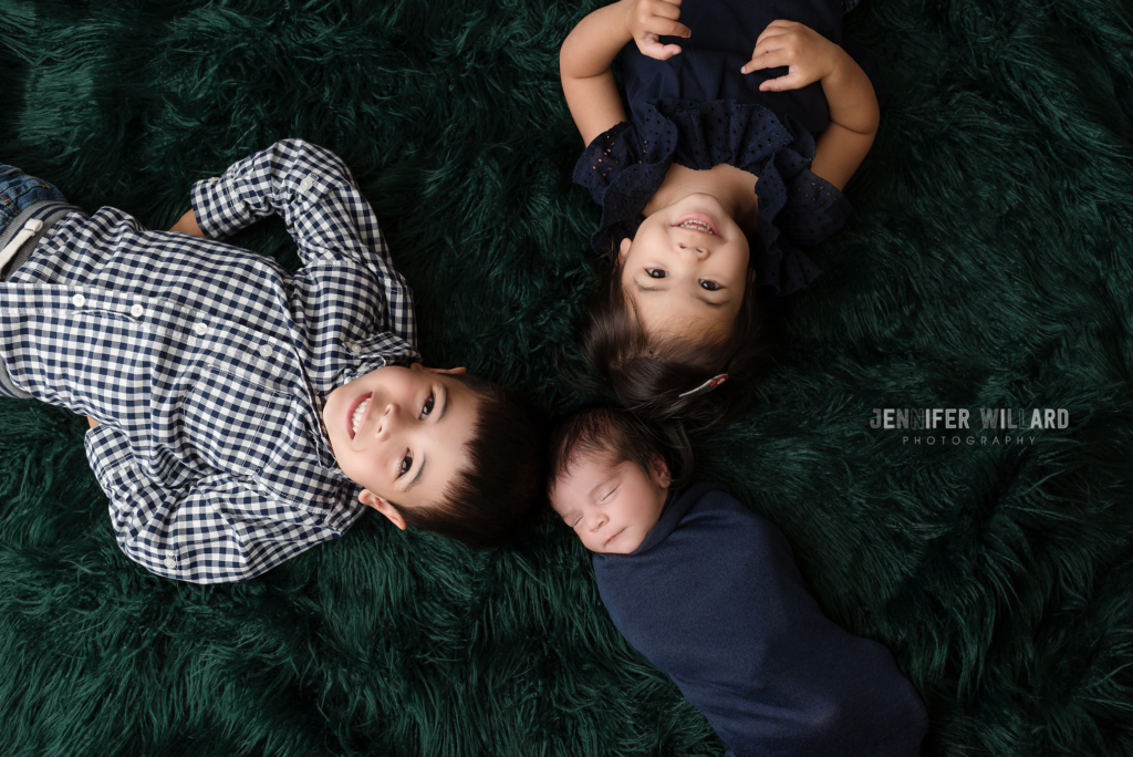 newborn posed portrait siblings green flokati Kingston Photographer