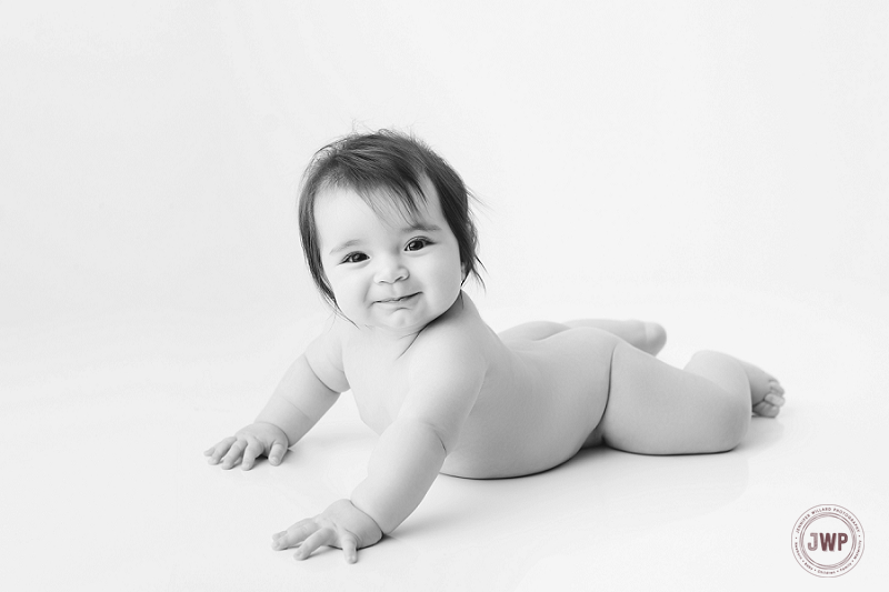 posed baby portrait 6 months old girl dress Kingston Children Photographer