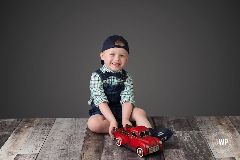 boy portrait 4 years overalls bowtie red truck Kingston birthday photographer