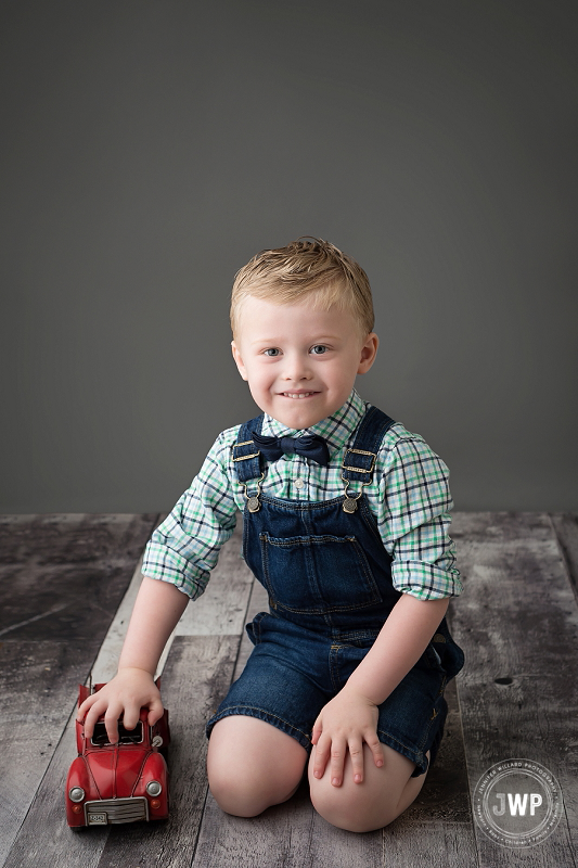 boy portrait 4 years suspenders bowtie red truck Kingston birthday photographer