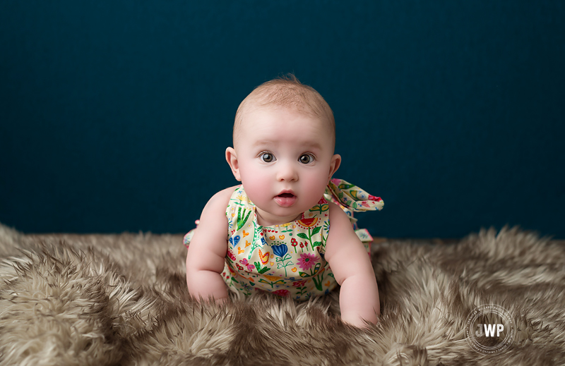 6 month old flower romper green backdrop Kingston Photographer