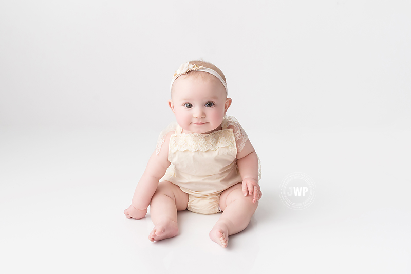 baby 6 months old lace romper Kingston Ontario Photographer