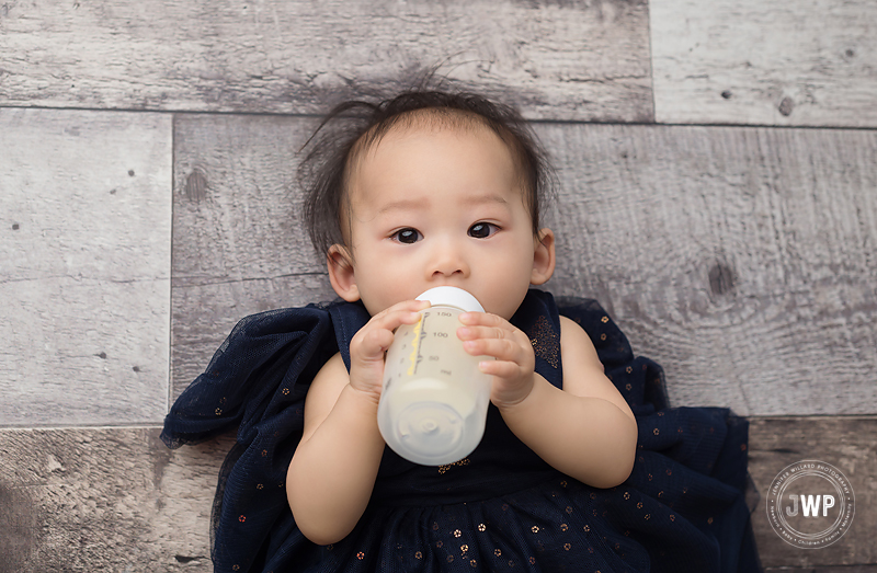 baby girl blue dress drinking bottle Kingston ontario photographer