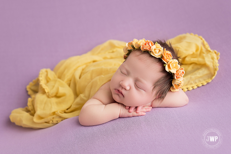 baby girl yellow flower headband wrap purple blanket Kingston newborn photographer