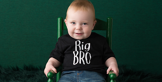 birthday boy rocking chair green backdrop Kingston children photographer