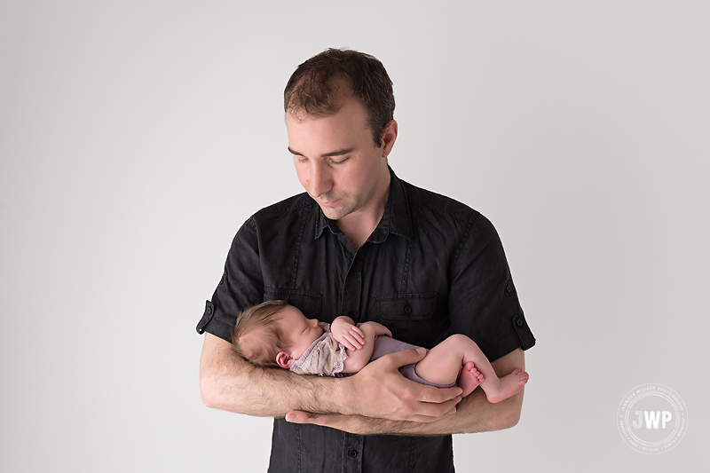 father holding daughter studio Kingston newborn portraits