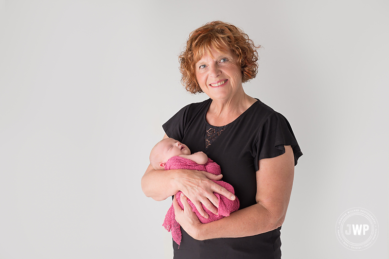 grandmother granddaughter newborn pink wrap Kingston portrait studio