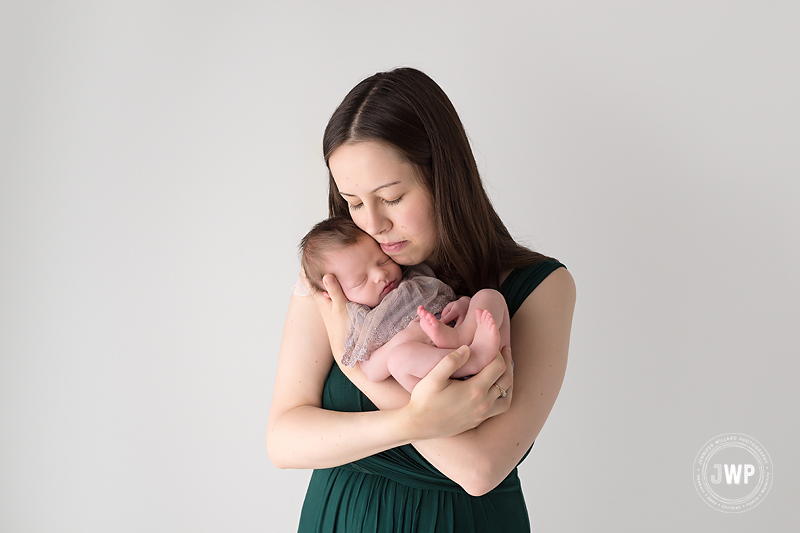 mother holding daughter Kingston newborn photographer