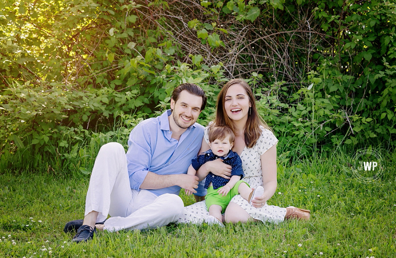 mother son father park grass Kingston family photographer