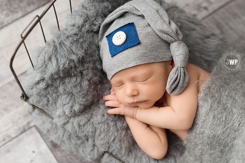 newborn boy sleeping sleepy hat Kingston newborn photographer