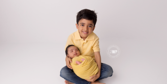 newborn sibling brother yellow shirt studio Asian Kingston photographer