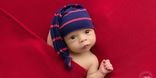 baby boy red blanket blue hat Kingston newborn photographer