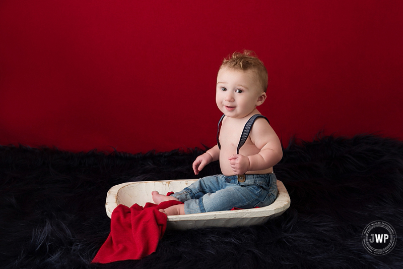 6 month baby boy red backdrop Kingston children Photographer