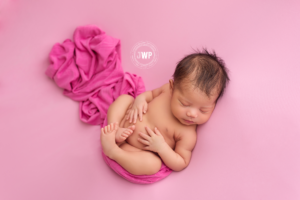 newborn girl pink blanket First Nations Kingston baby photographer