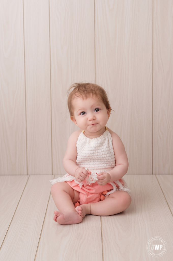 6 month old girl pink white romper Kingston baby photographer