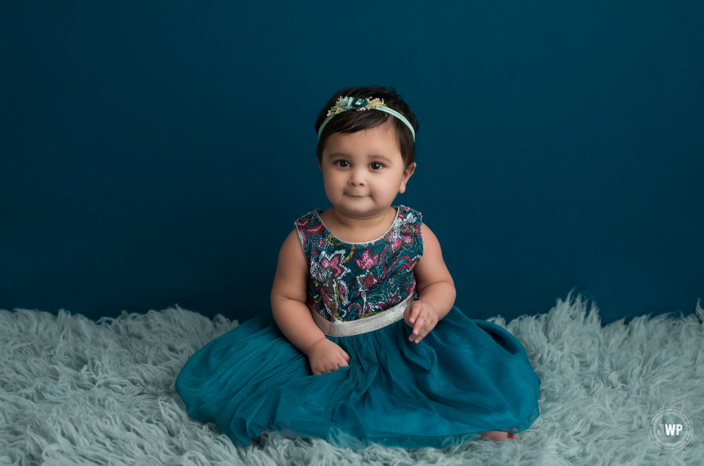6 month old girl teal backdrop teal dress Kingston baby photographer