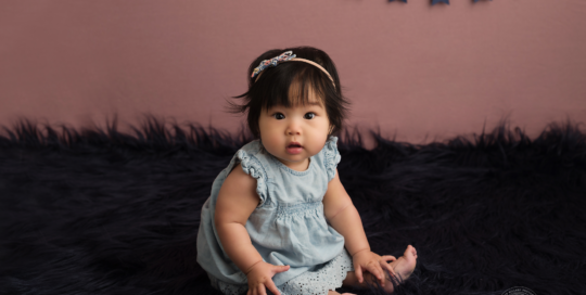 6 month old baby girl in blue jean dress kingston baby photographer