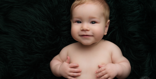 7 month old baby boy green flokati Kingston baby photographer