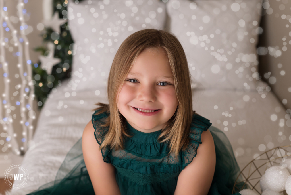 Winter Mini session girl green dress lights Kingston family photographer