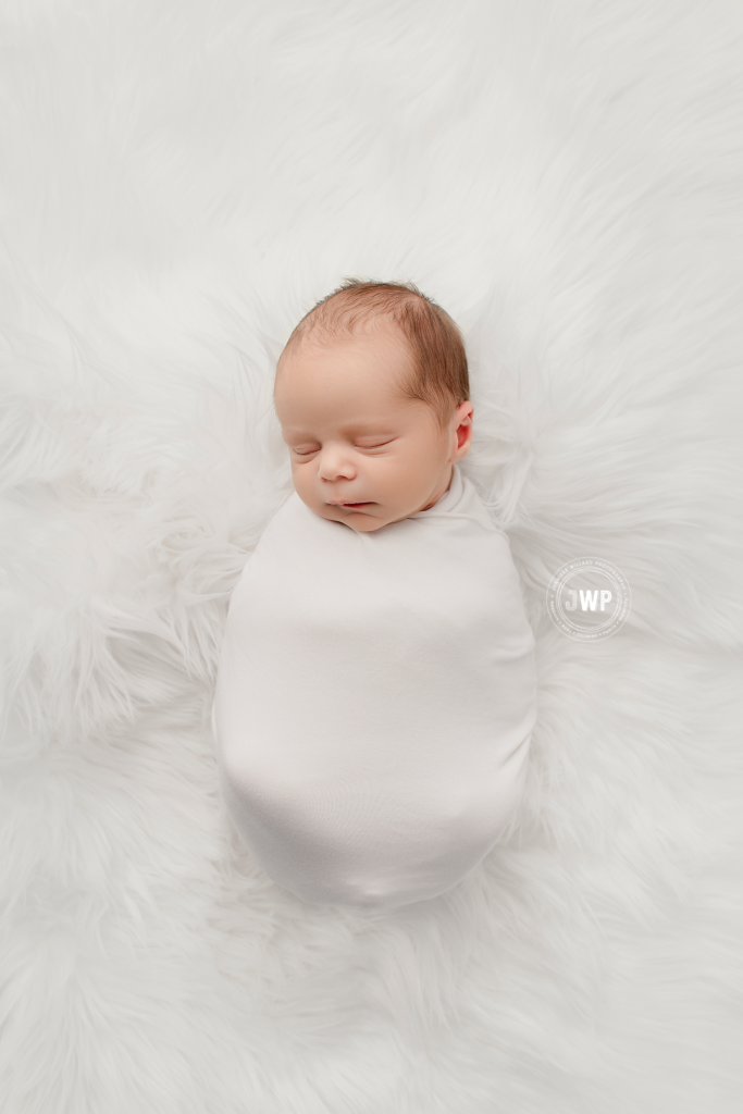 baby boy white wrap white flokati Kingston ontario newborn photographer