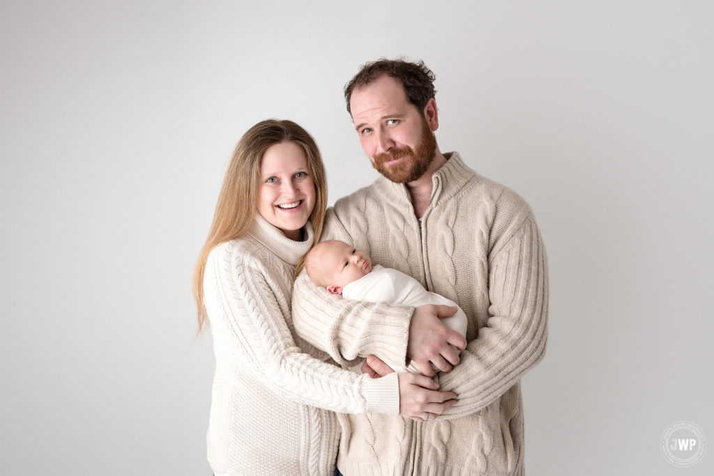 baby boy wrapped parents Kingston newborn photographer