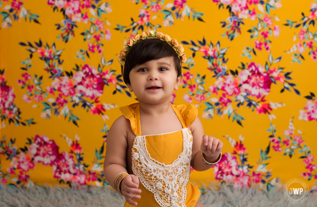 baby first birthday milestone pink yellow backdrop Kingston portrait photographer