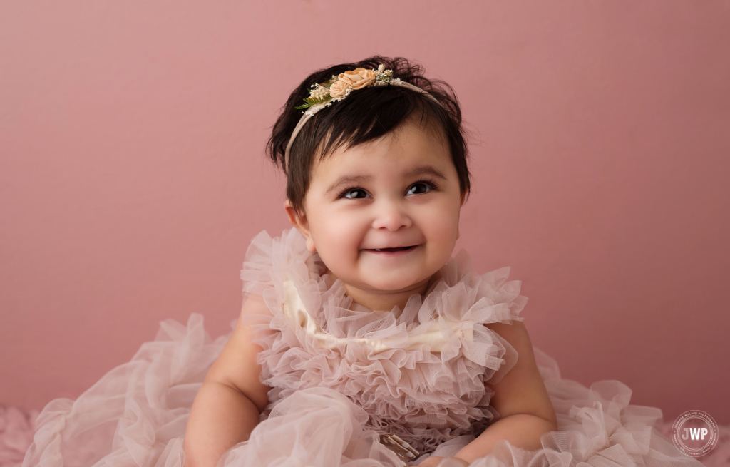 baby girl 6 month old blush pink ruffle dress flower headband Kingston portrait studio