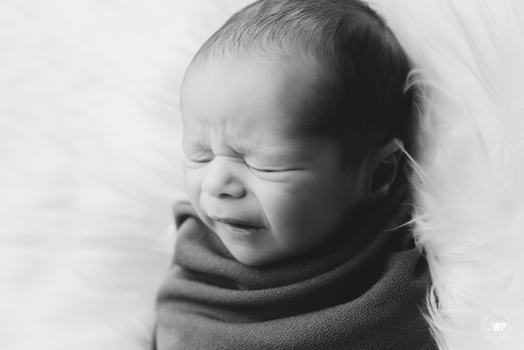 black and white baby crying Kingston newborn photographer